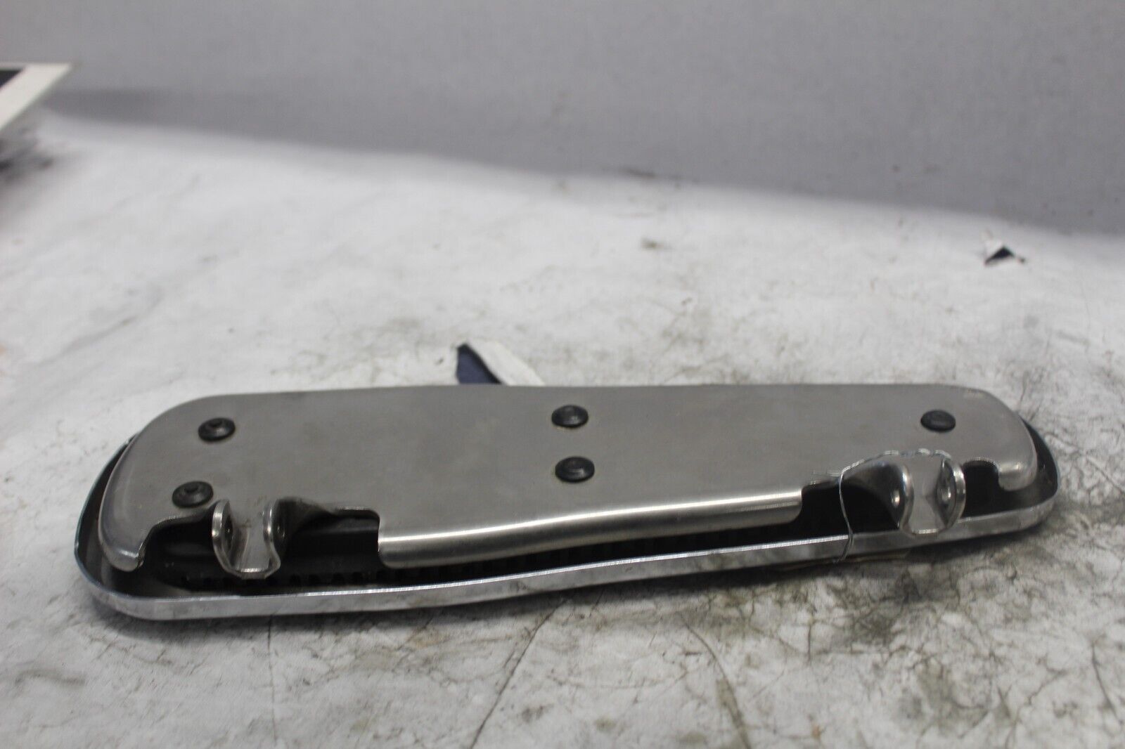 LEFT FOOTBOARD ASSY 50699-05 2005 HD SOFTAIL DELUXE FLSTNI