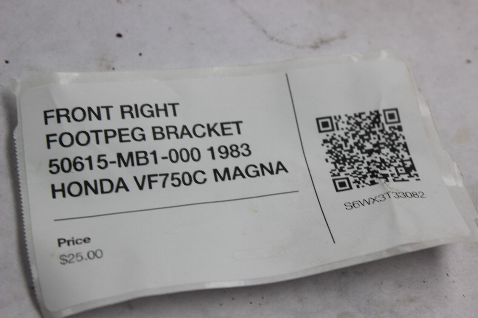 FRONT RIGHT FOOTPEG BRACKET 50615-MB1-000 1983 HONDA VF750C MAGNA