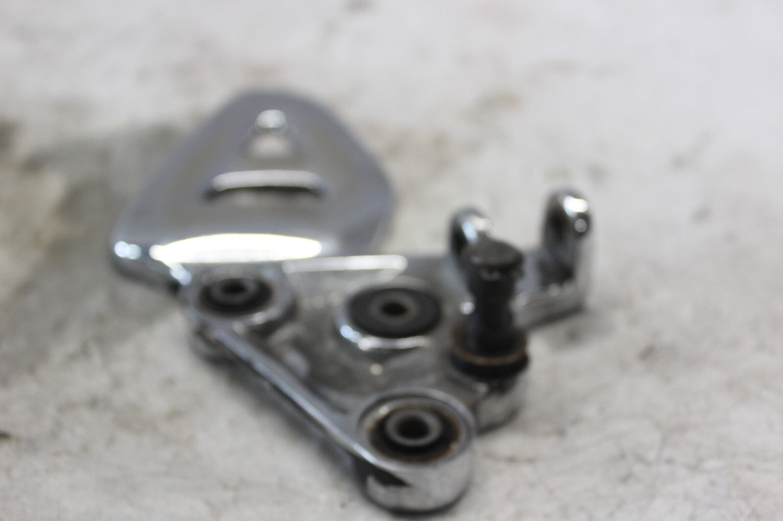 FRONT LEFT FOOTREST BRACKET CHROME 43521-24F00 2002 SUZUKI HAYABUSA GSX1300R