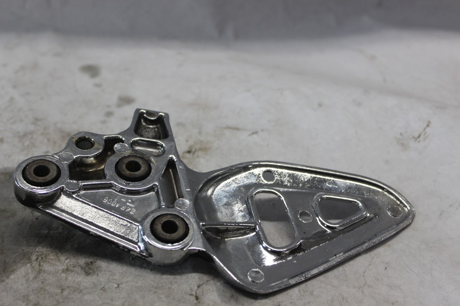 FRONT LEFT FOOTREST BRACKET CHROME 43521-24F00 2002 SUZUKI HAYABUSA GSX1300R