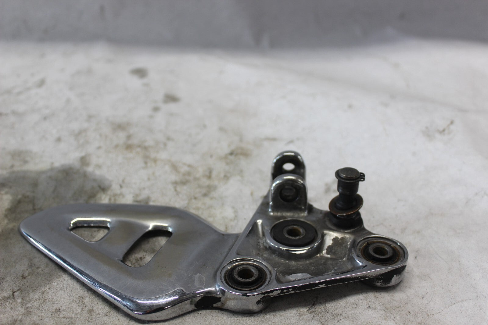 FRONT LEFT FOOTREST BRACKET CHROME 43521-24F00 2002 SUZUKI HAYABUSA GSX1300R