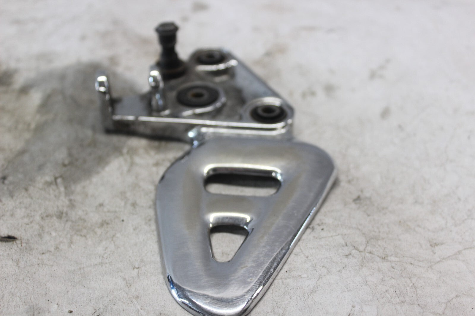 FRONT LEFT FOOTREST BRACKET CHROME 43521-24F00 2002 SUZUKI HAYABUSA GSX1300R