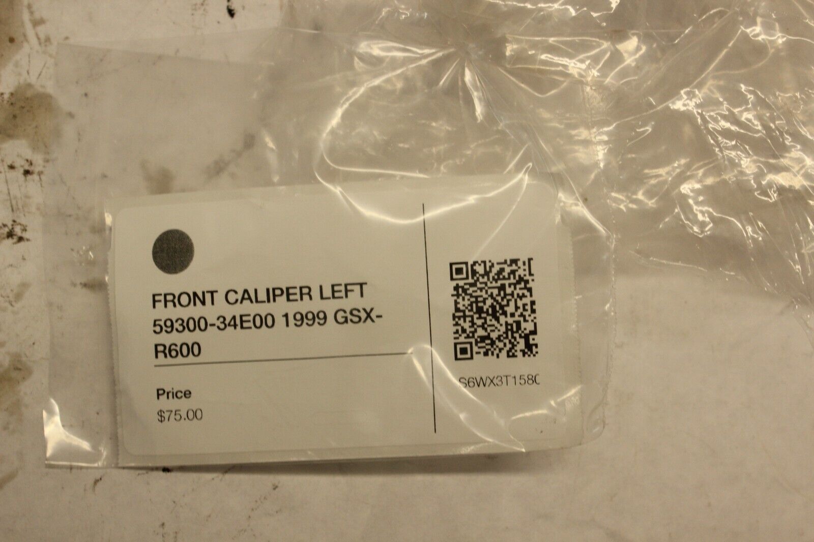 FRONT CALIPER LEFT 59300-34E00 1999 Suzuki GSX-R600