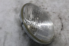 HEADLIGHT MOUNTING RING 67769-93 1995 HD DYNA FXDS