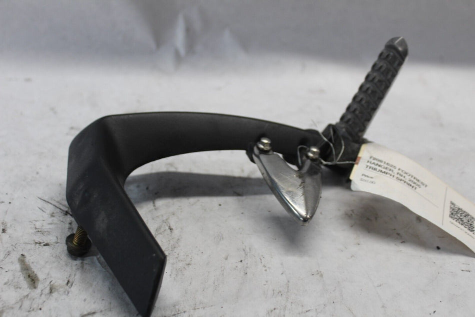 T2081625 FOOTREST HANGER, RH, 2005 TRIUMPH SPRINT
