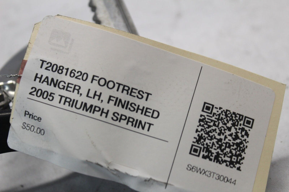T2081620 FOOTREST HANGER, LH, FINISHED 2005 TRIUMPH SPRINT