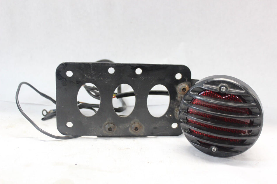 AFTERMARKET AXLE MOUNTED LICENSE PLATE FRAME W/LIGHT 1996 VIRAGO XV1100S