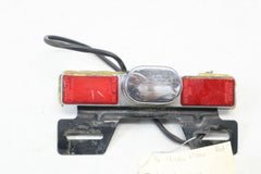 OEM Honda Motorcycle License Plate Light 1986 VT 500C Shadow Red 33720-MF5-670